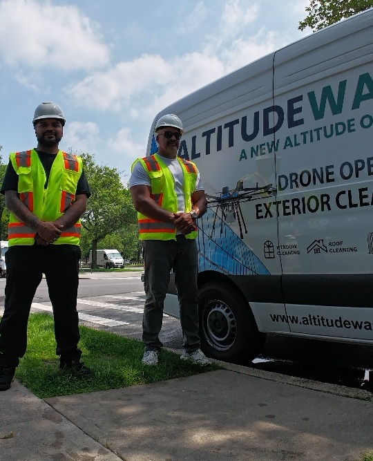 Graffiti Removal Two Pilots Posing with the Van